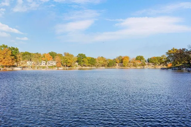 $587,000 | 779 Northwest South Shore Drive, Lake Waukomis, MO 64151