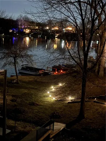 $587,000 | 779 Northwest South Shore Drive, Lake Waukomis, MO 64151