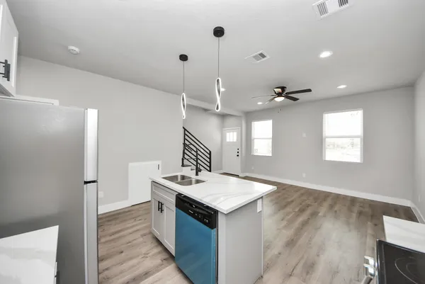 a bathroom with a double vanity sink and mirror