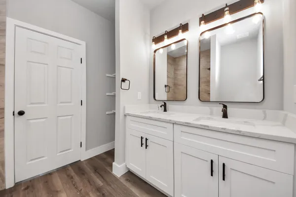 a bathroom with a white toilet sitting next to a bathtub