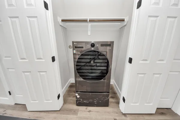 a bathroom with a double vanity sink and mirror