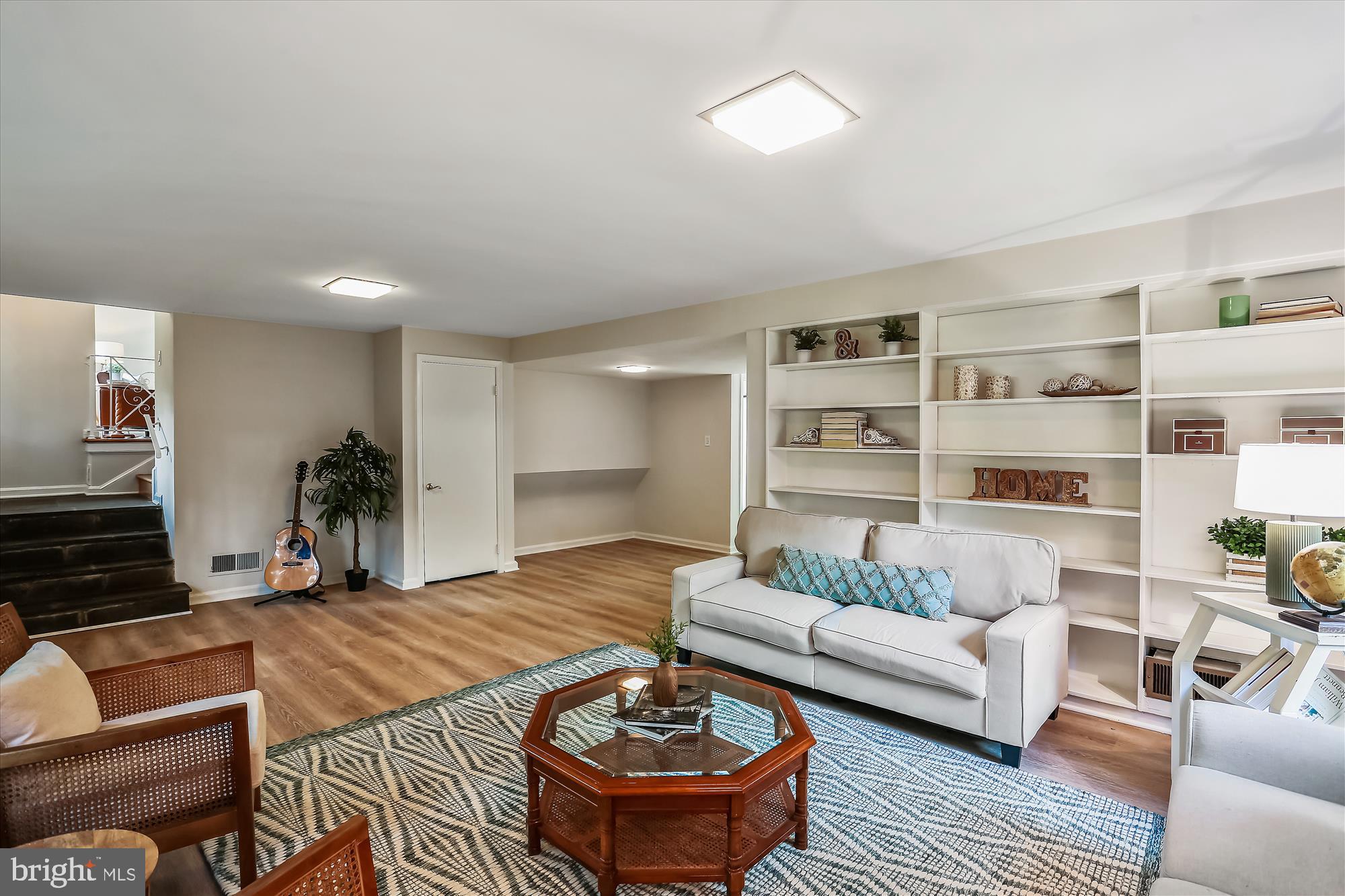 8214 Beech Tree Road Bethesda, MD 20817 - Photo 31 of 50 Family Room with bookshelves