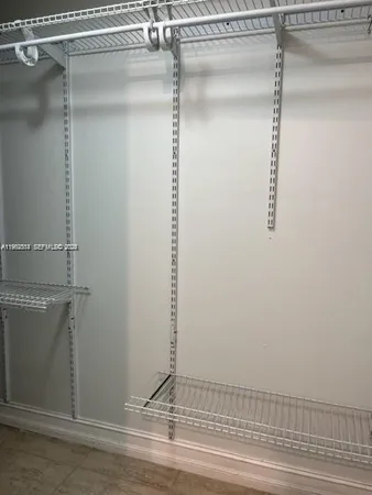 a view of a room with rack on the wall