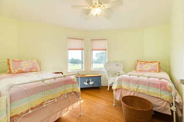 a bedroom with a bed and a table