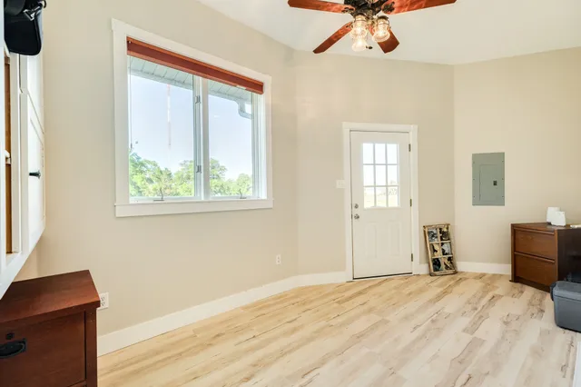 a backyard of a house with lots of green space