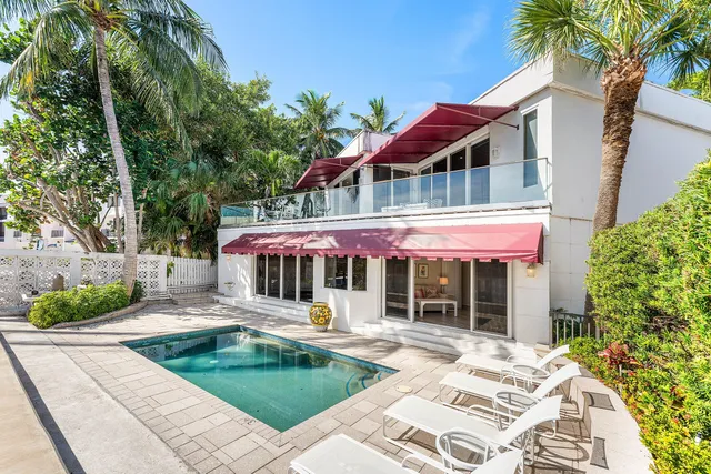 a front view of a house with a patio