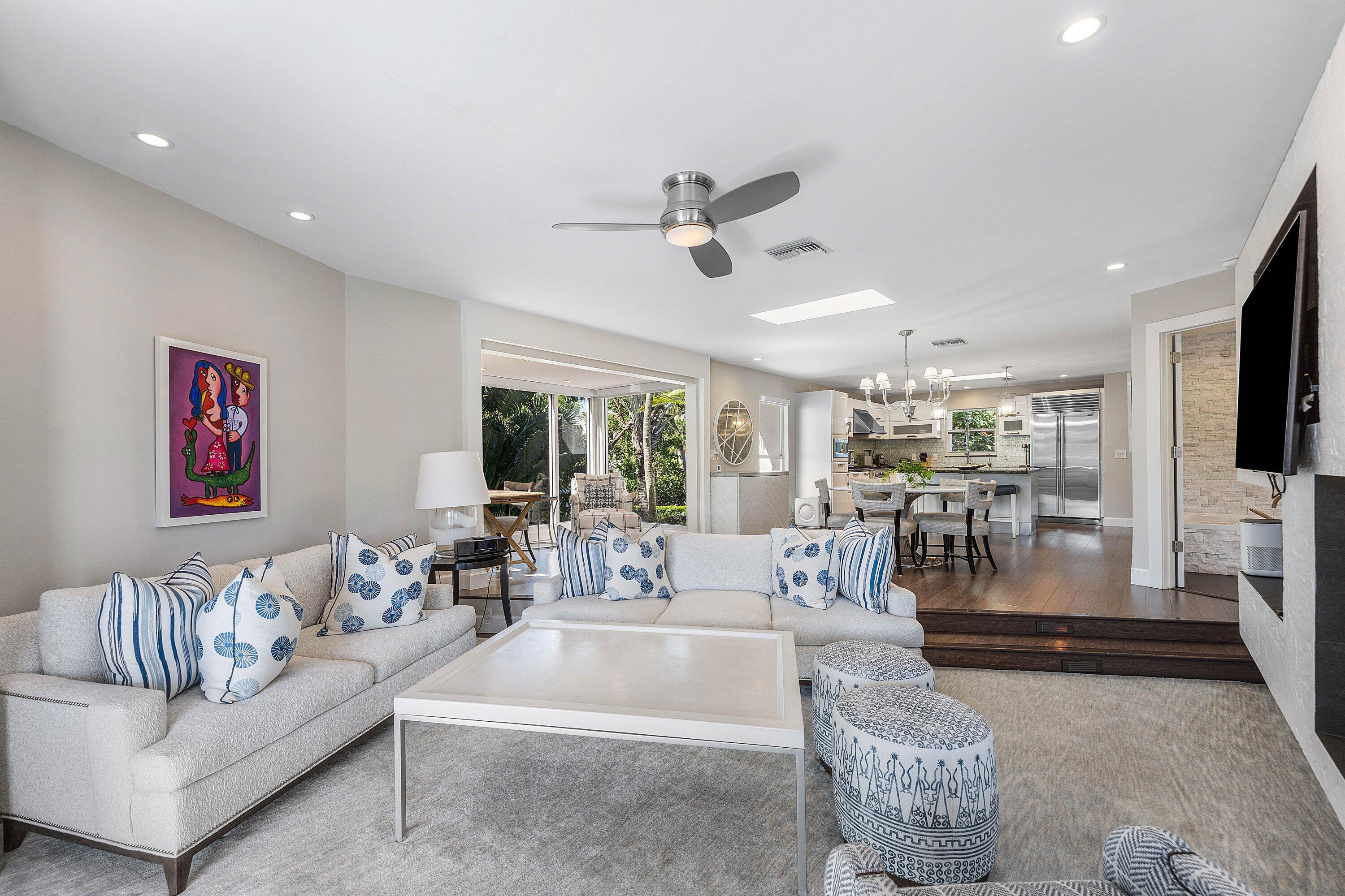 811 Palm Trail Delray Beach, FL 33483 - Photo 4 of 57 a living room with furniture and a large window