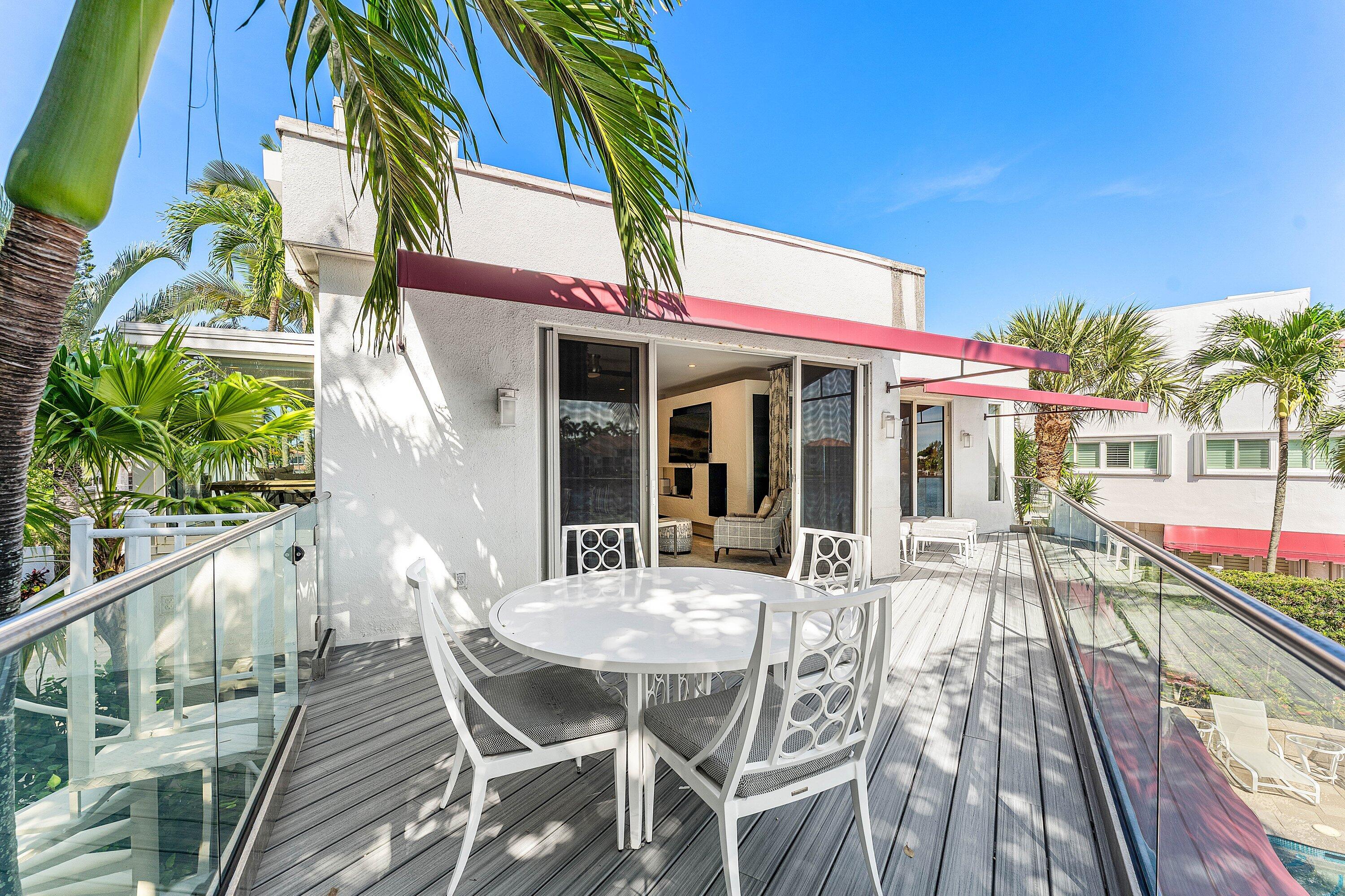 811 Palm Trail Delray Beach, FL 33483 - Photo 44 of 57 a view of a house with a patio