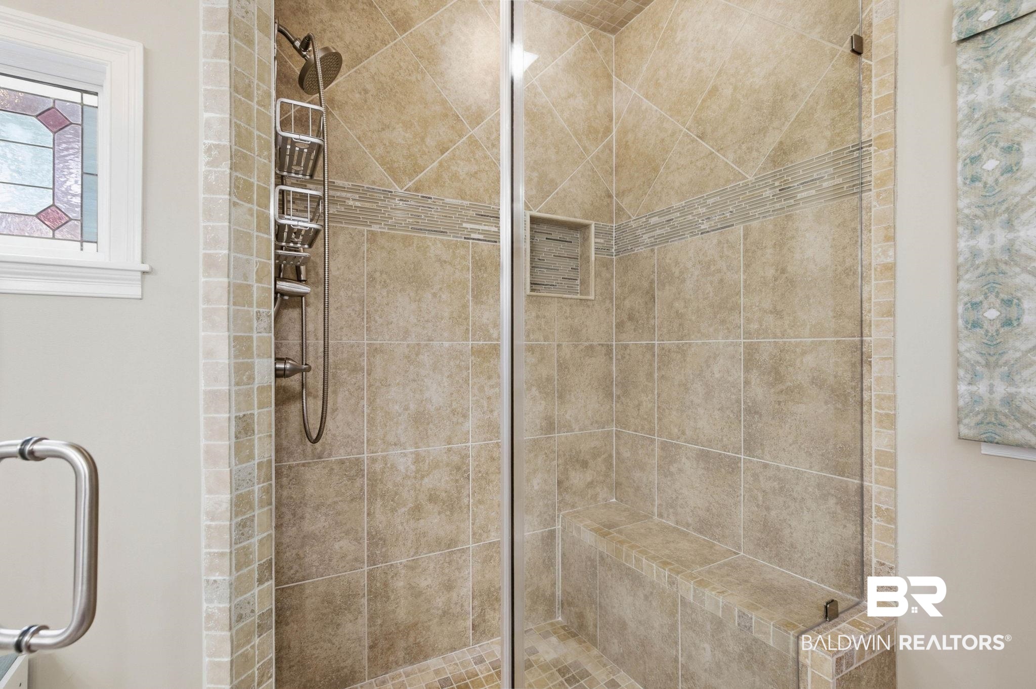 31515 Rhett Drive Spanish Fort, AL 36527 - Photo 38 of 100 The Primary Bathrooms has a custom tiled shower and a double vanity with quartz countertops