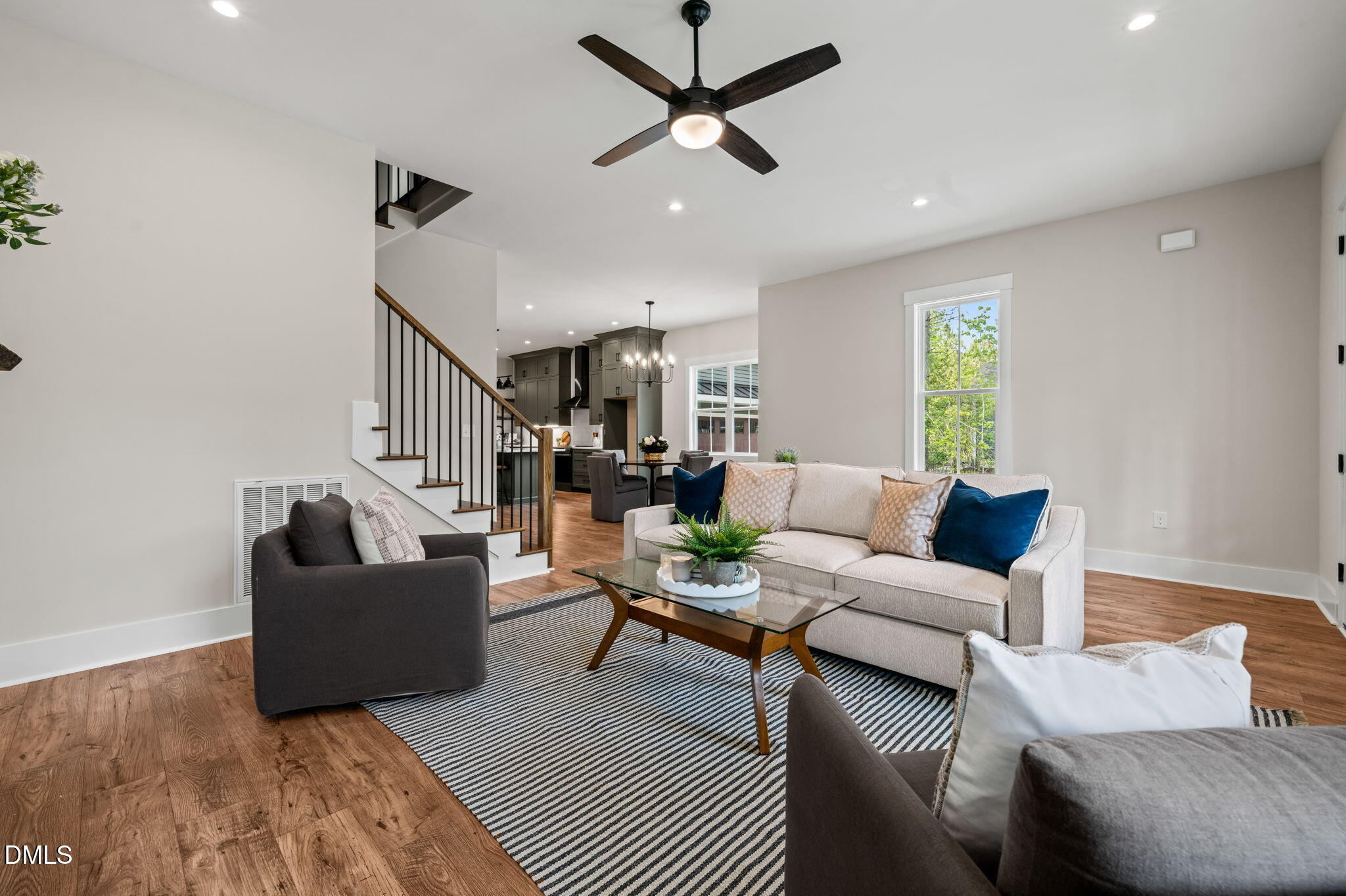 400 Pilot Ridge Road Zebulon, NC 27597 - Photo 9 of 51 a living room with furniture and a wooden floor