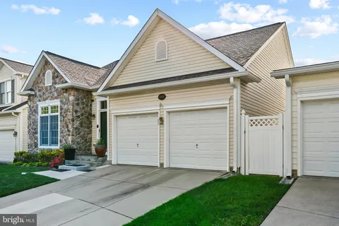 front view of a house and a yard