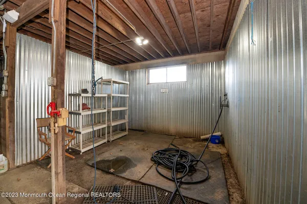 a kitchen with cabinets a stove and a table