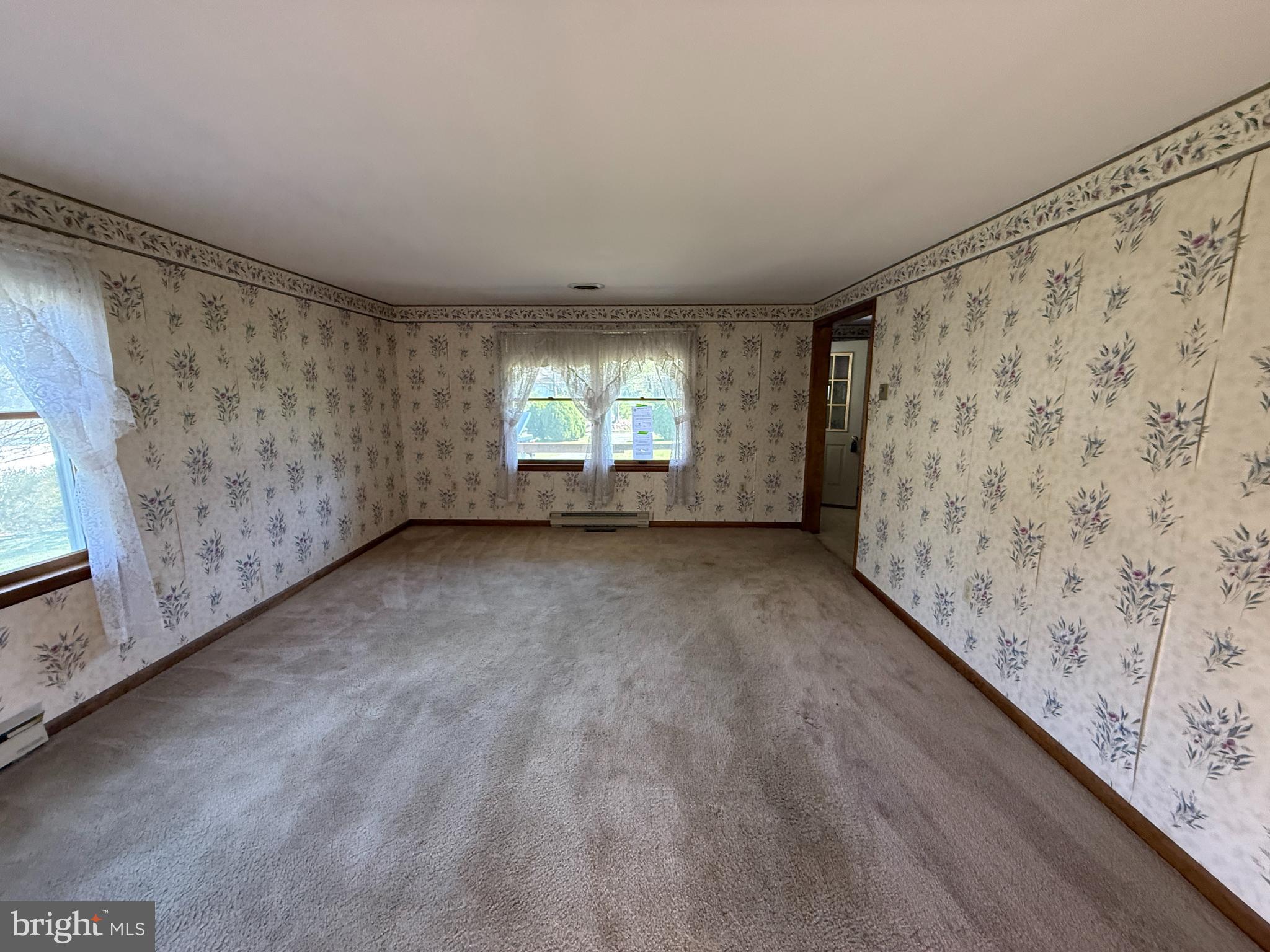 17827 Bakersville Road Boonsboro, MD 21713 - Photo 12 of 16 a view of room with window and stairs