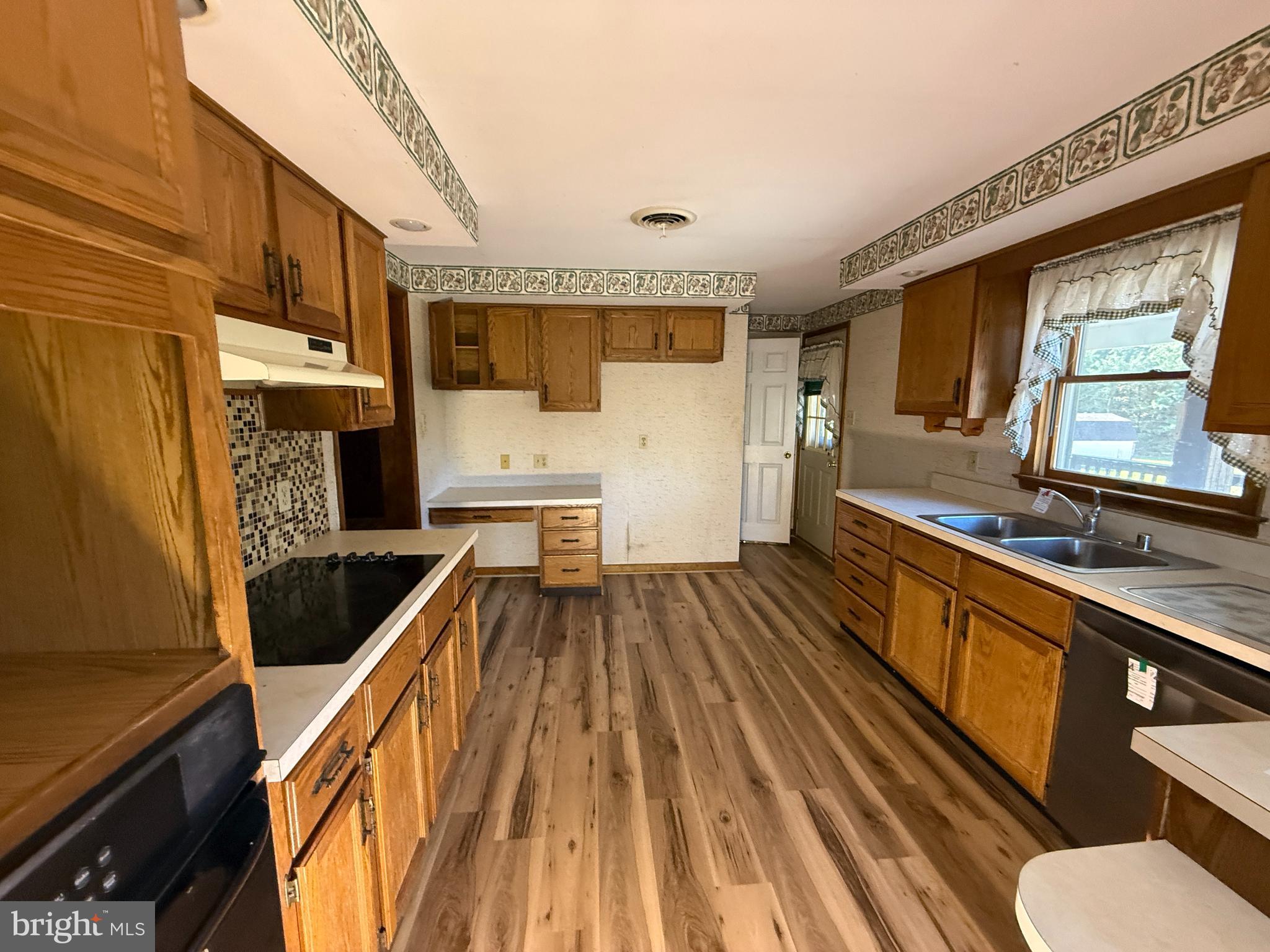 17827 Bakersville Road Boonsboro, MD 21713 - Photo 14 of 16 a spacious bathroom with a granite countertop sink and a large mirror