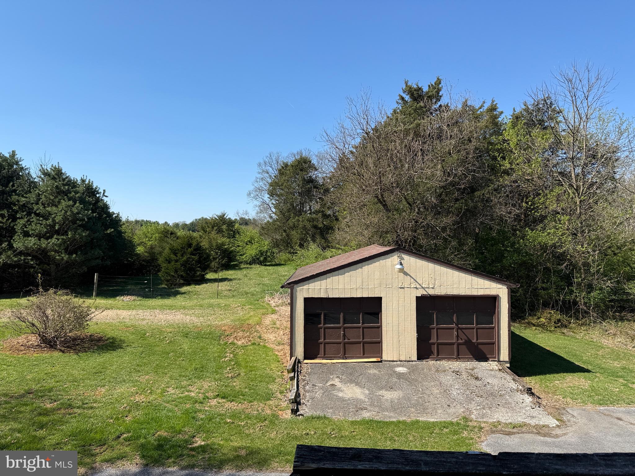 17827 Bakersville Road Boonsboro, MD 21713 - Photo 5 of 16 a view of a small house with a yard