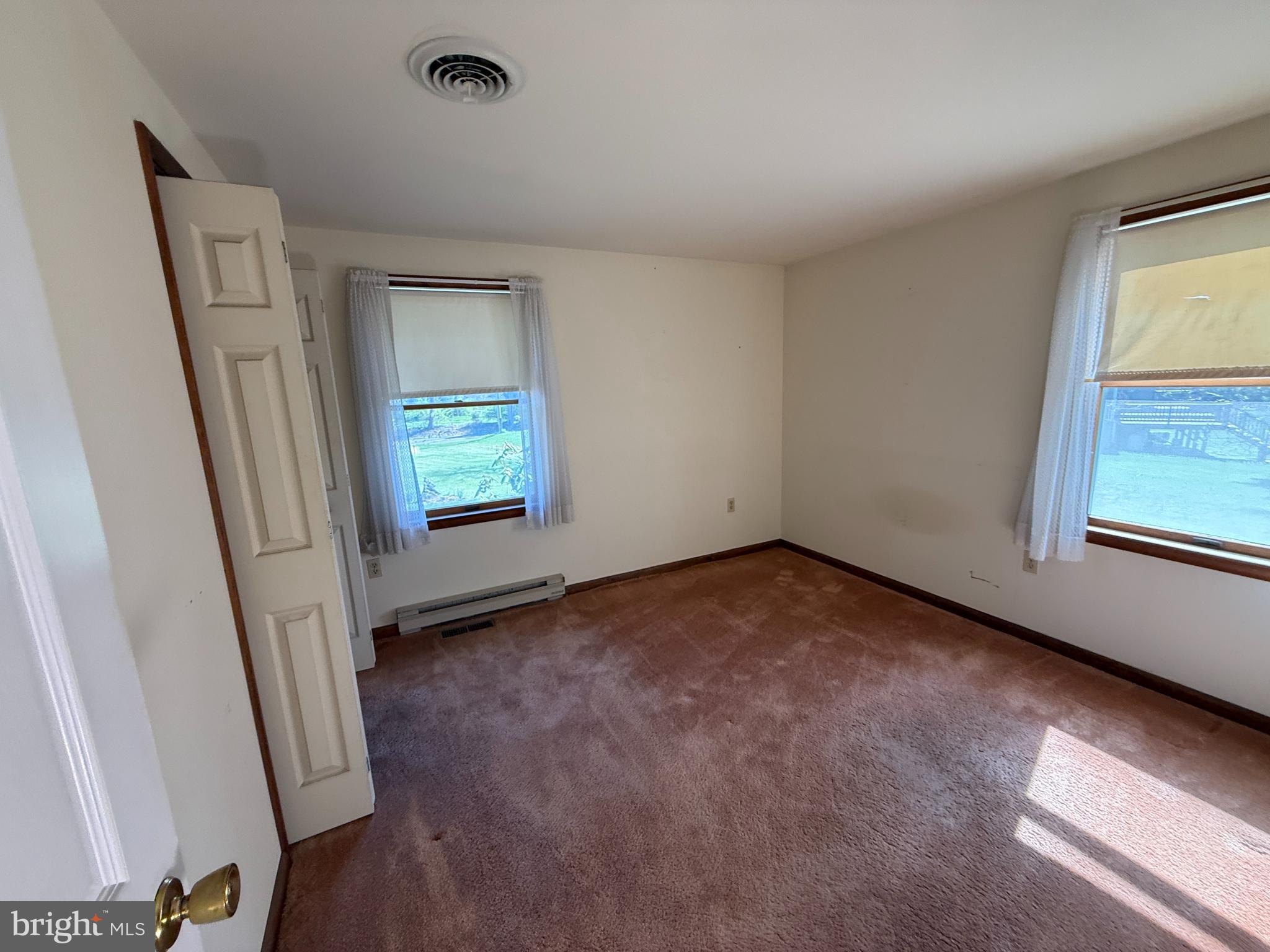 17827 Bakersville Road Boonsboro, MD 21713 - Photo 6 of 16 an empty room with windows