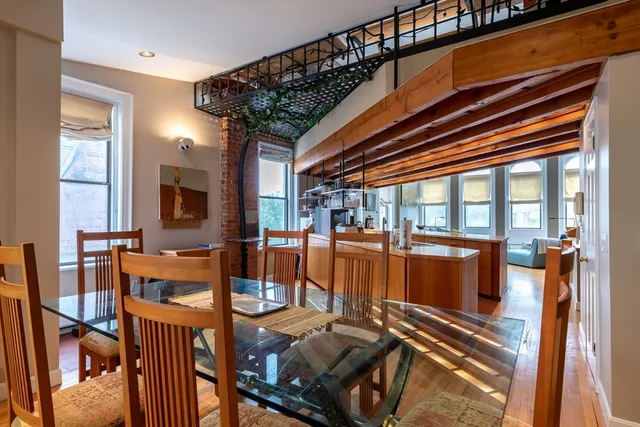 a view of a living room with furniture
