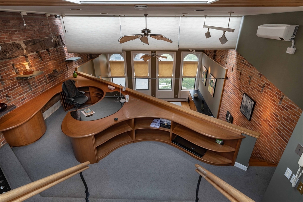 135 Main Street Northampton, MA 01060 - Photo 24 of 28 a bedroom with furniture and a window