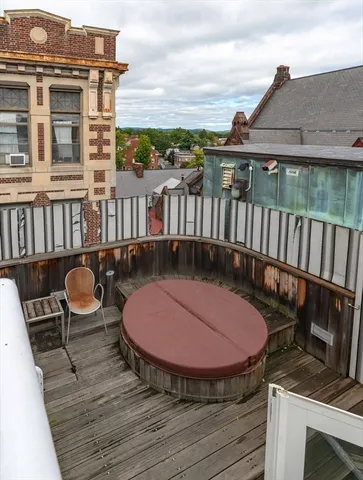 a view of a balcony with city view