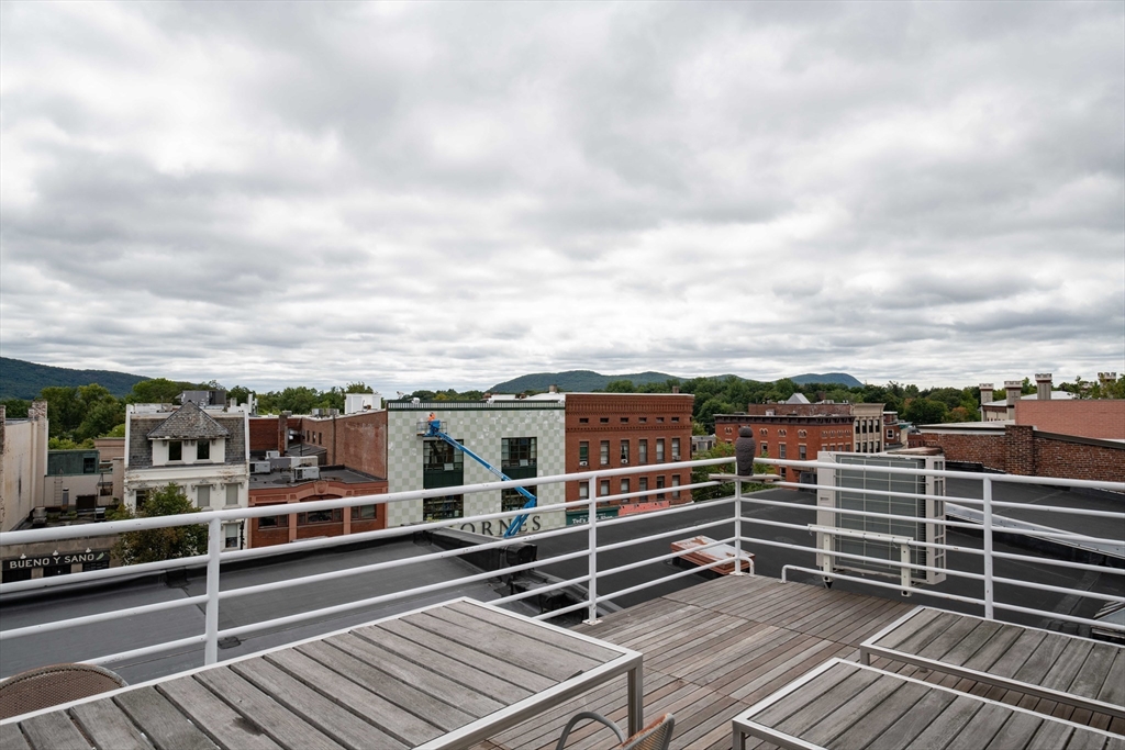 135 Main Street Northampton, MA 01060 - Photo 26 of 28 a view of a balcony with city view