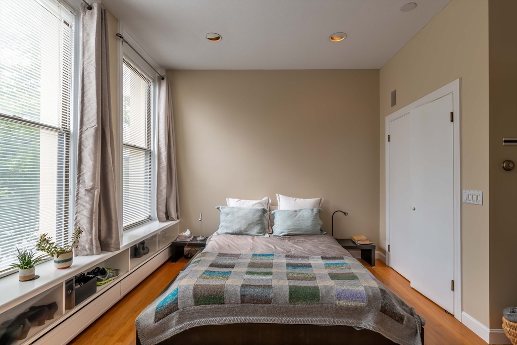 135 Main Street Northampton, MA 01060 - Photo 5 of 28 a bedroom with a bed and a large window