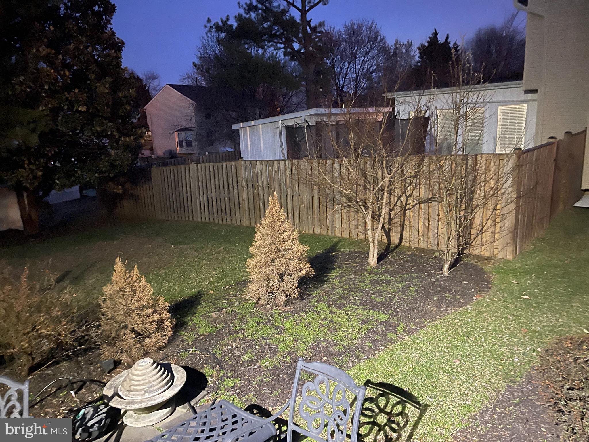 10918 Spyglass Hill Bowie, MD 20721 - Photo 8 of 9 a backyard of a house with lots of green space