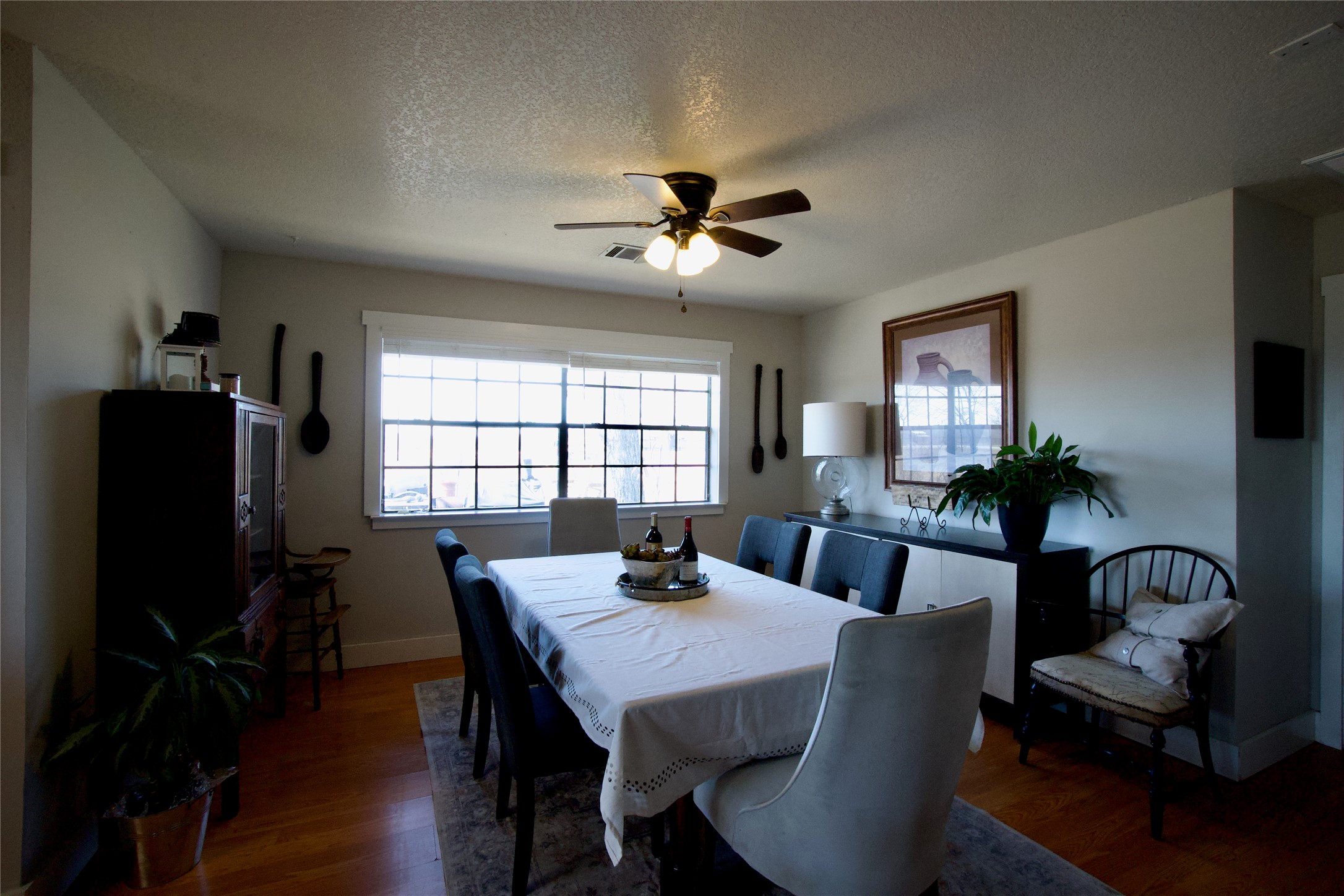 2352 Borchert Loop Lockhart, TX 78644 - Photo 11 of 39 a view of a dining room with furniture and wooden floor