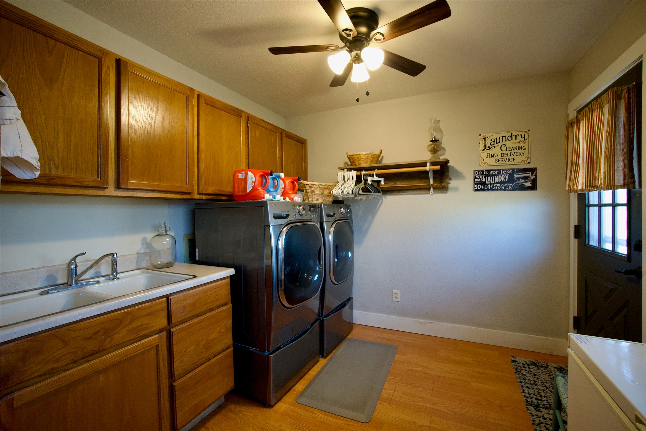 2352 Borchert Loop Lockhart, TX 78644 - Photo 14 of 39 a view of a kitchen with fridge and workspace