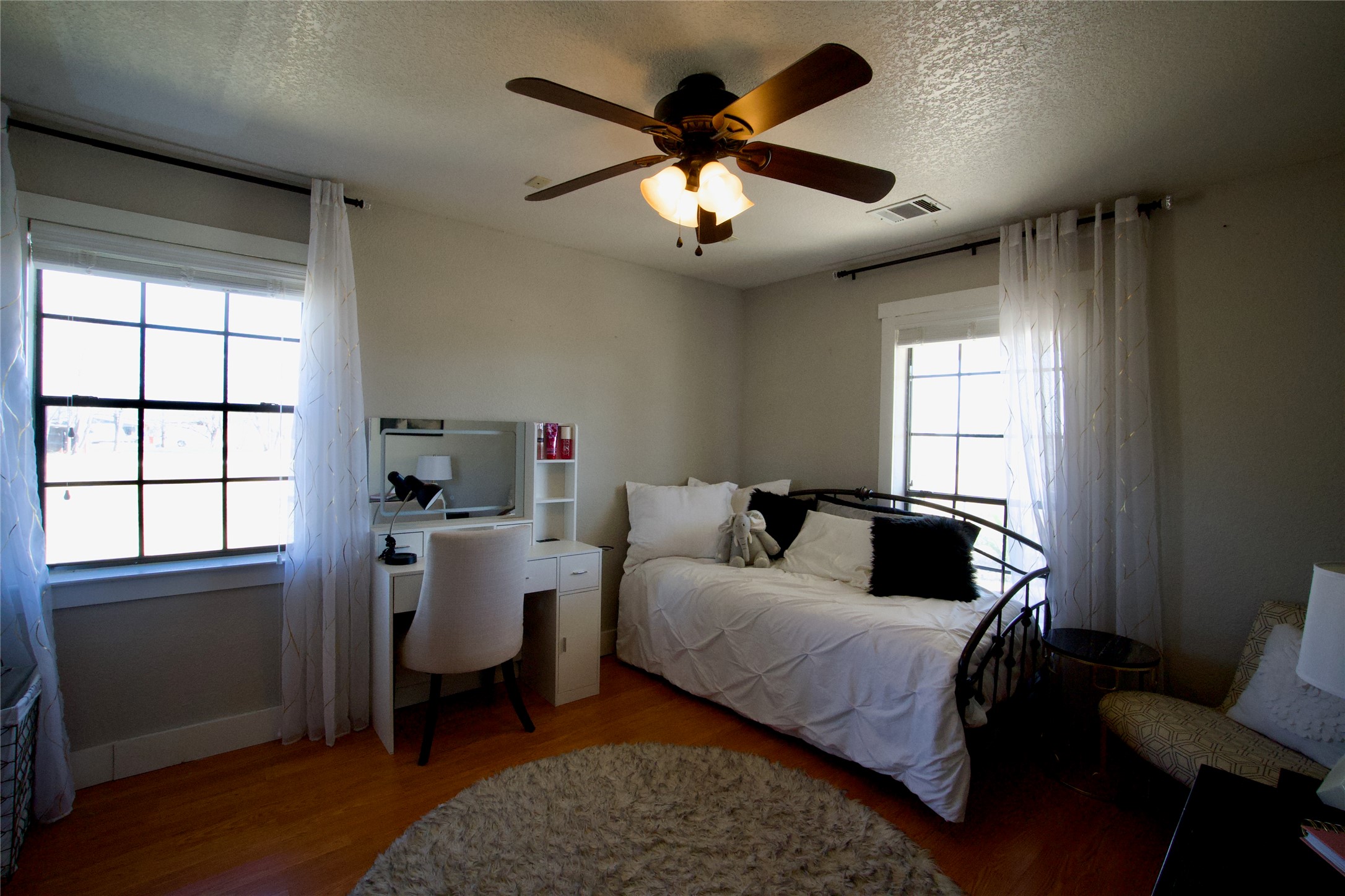 2352 Borchert Loop Lockhart, TX 78644 - Photo 16 of 39 a bed room with a bed and a window