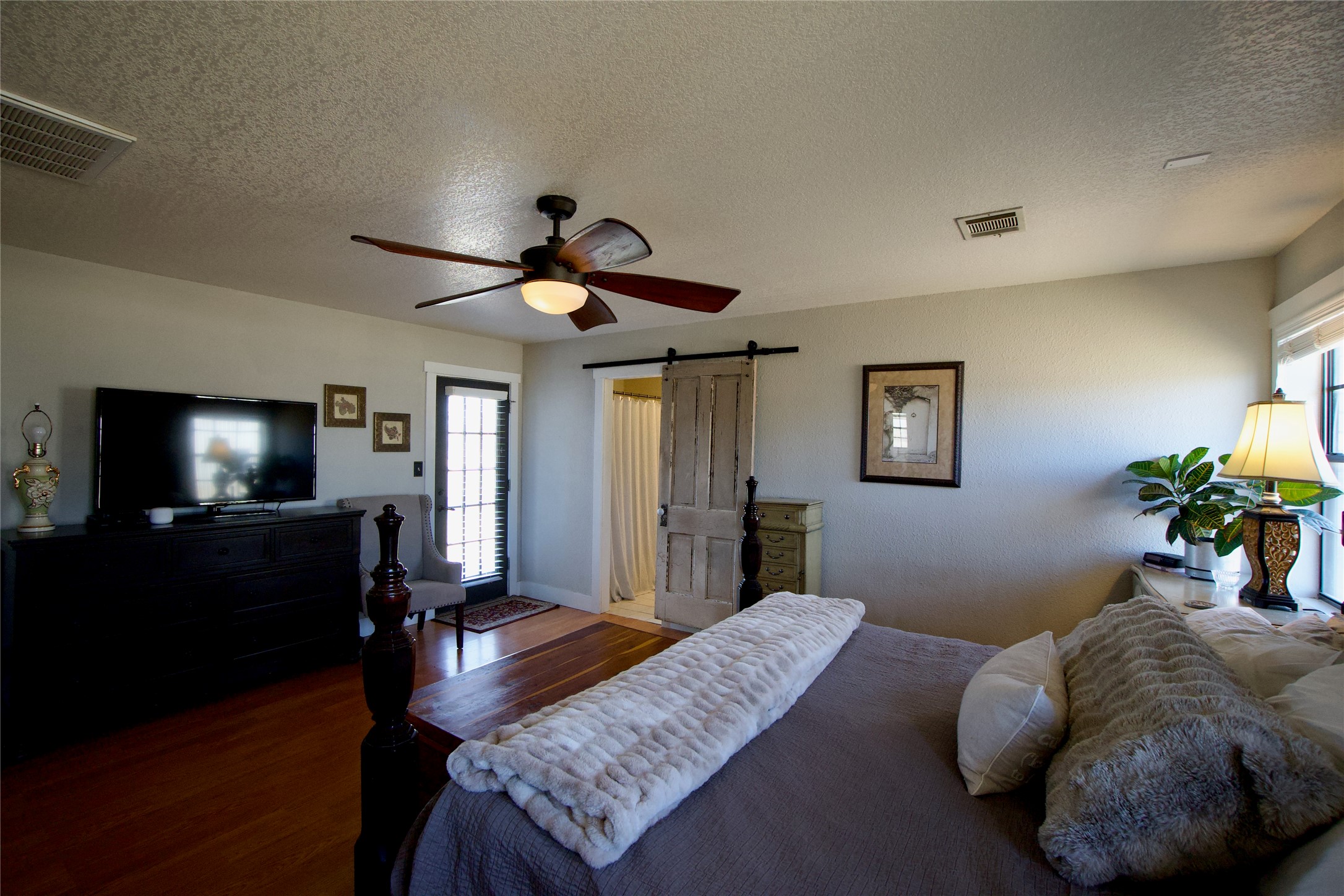 2352 Borchert Loop Lockhart, TX 78644 - Photo 26 of 39 a living room with furniture and a flat screen tv