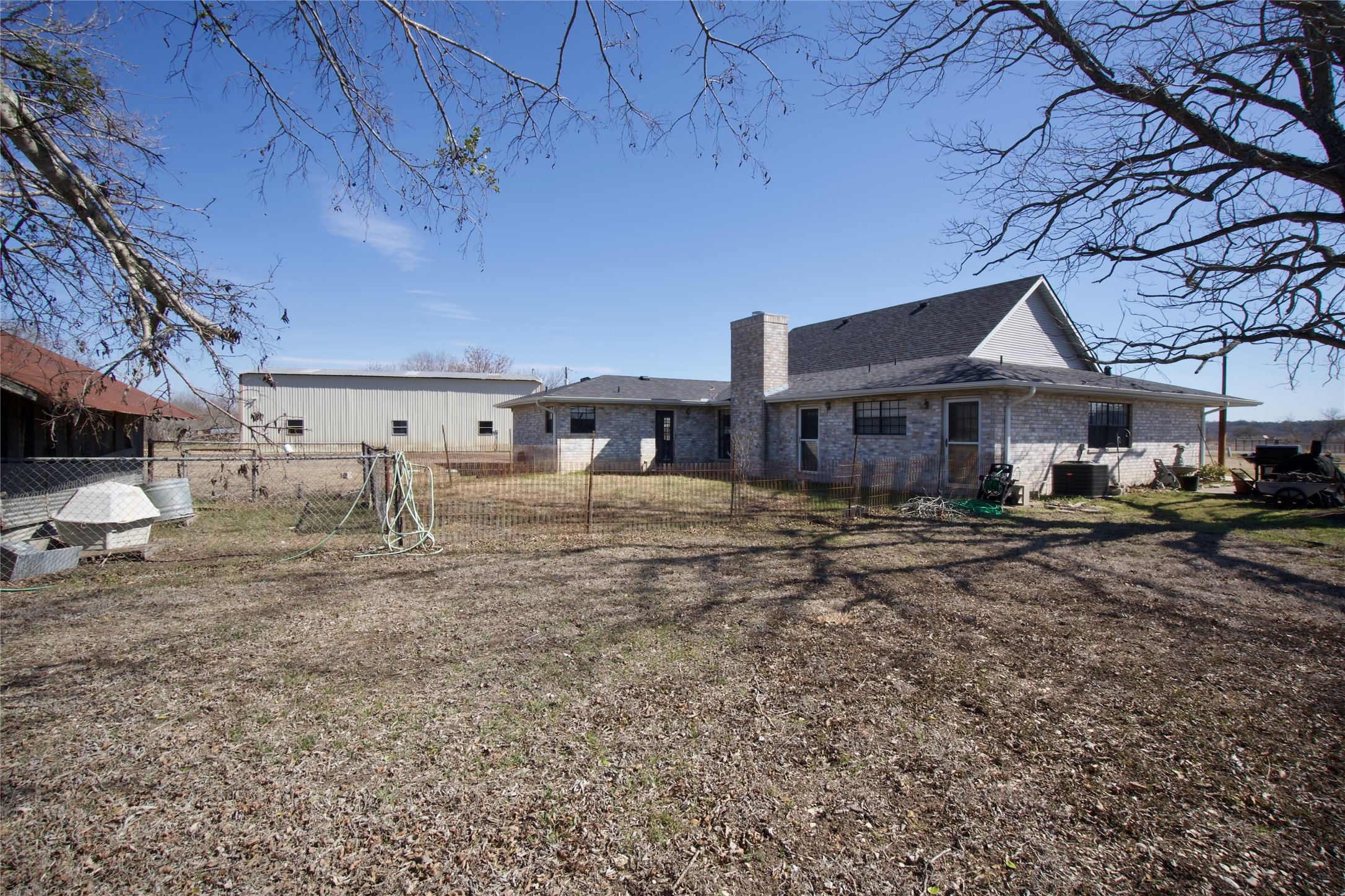2352 Borchert Loop Lockhart, TX 78644 - Photo 30 of 39 a front view of a house with a yard