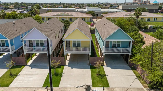 an aerial view of a house with swimming pool