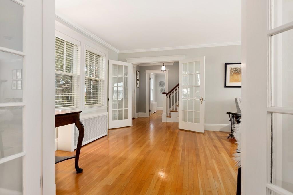 30 Homestead Road Marblehead, MA 01945 - Photo 14 of 35 a view of an empty room with a window and wooden floor