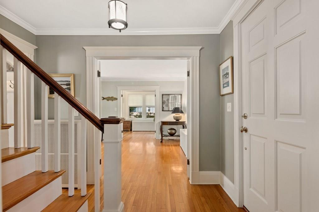 30 Homestead Road Marblehead, MA 01945 - Photo 7 of 35 a view of entryway with wooden floor and stairs
