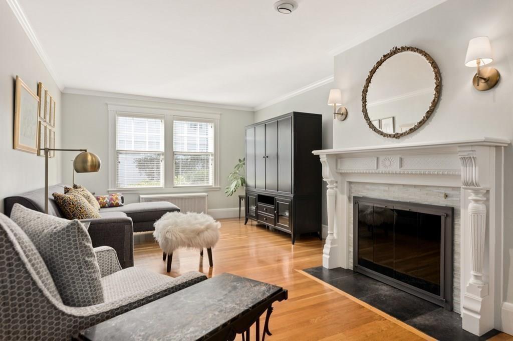 30 Homestead Road Marblehead, MA 01945 - Photo 9 of 35 a living room with furniture a window and a fireplace