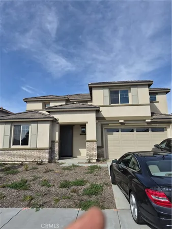 a view of a house with a patio
