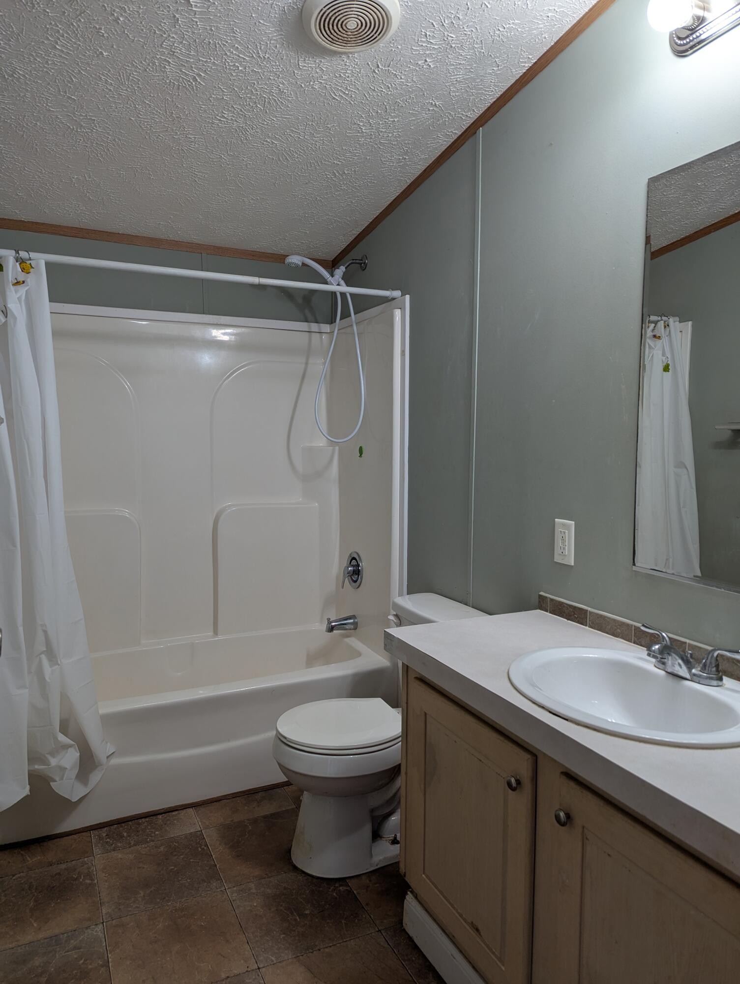 313 Burton Road Sweetwater, TN 37874 - Photo 21 of 38 a bathroom with a sink toilet and shower
