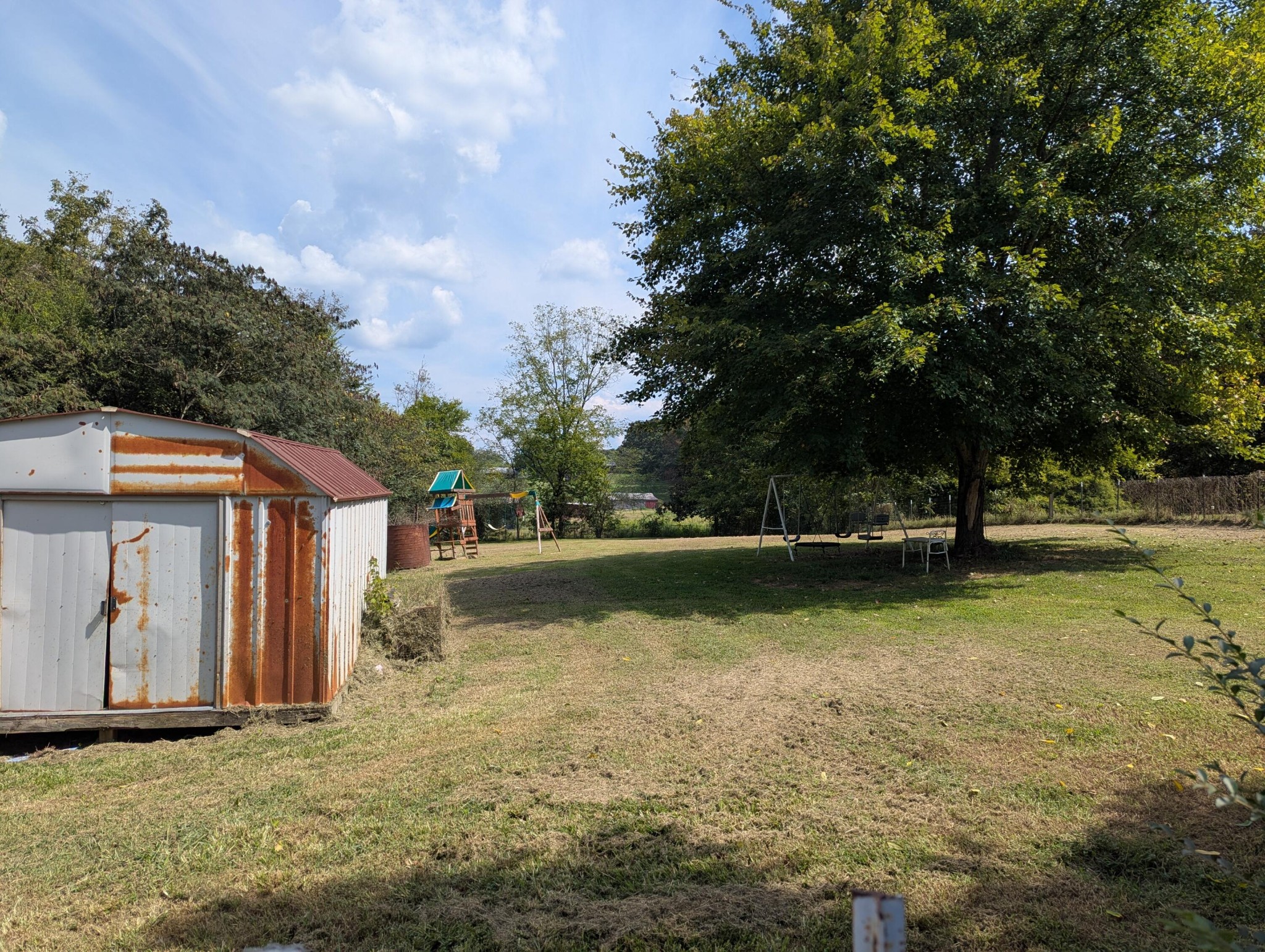 313 Burton Road Sweetwater, TN 37874 - Photo 3 of 38 a view of a house with yard and lake view