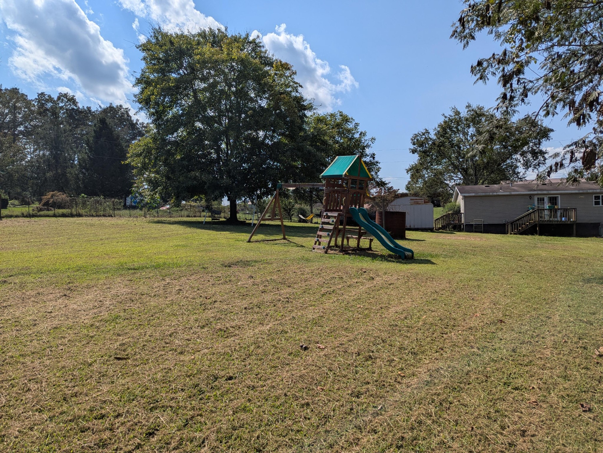 313 Burton Road Sweetwater, TN 37874 - Photo 34 of 38 a view of a park with swings and slides