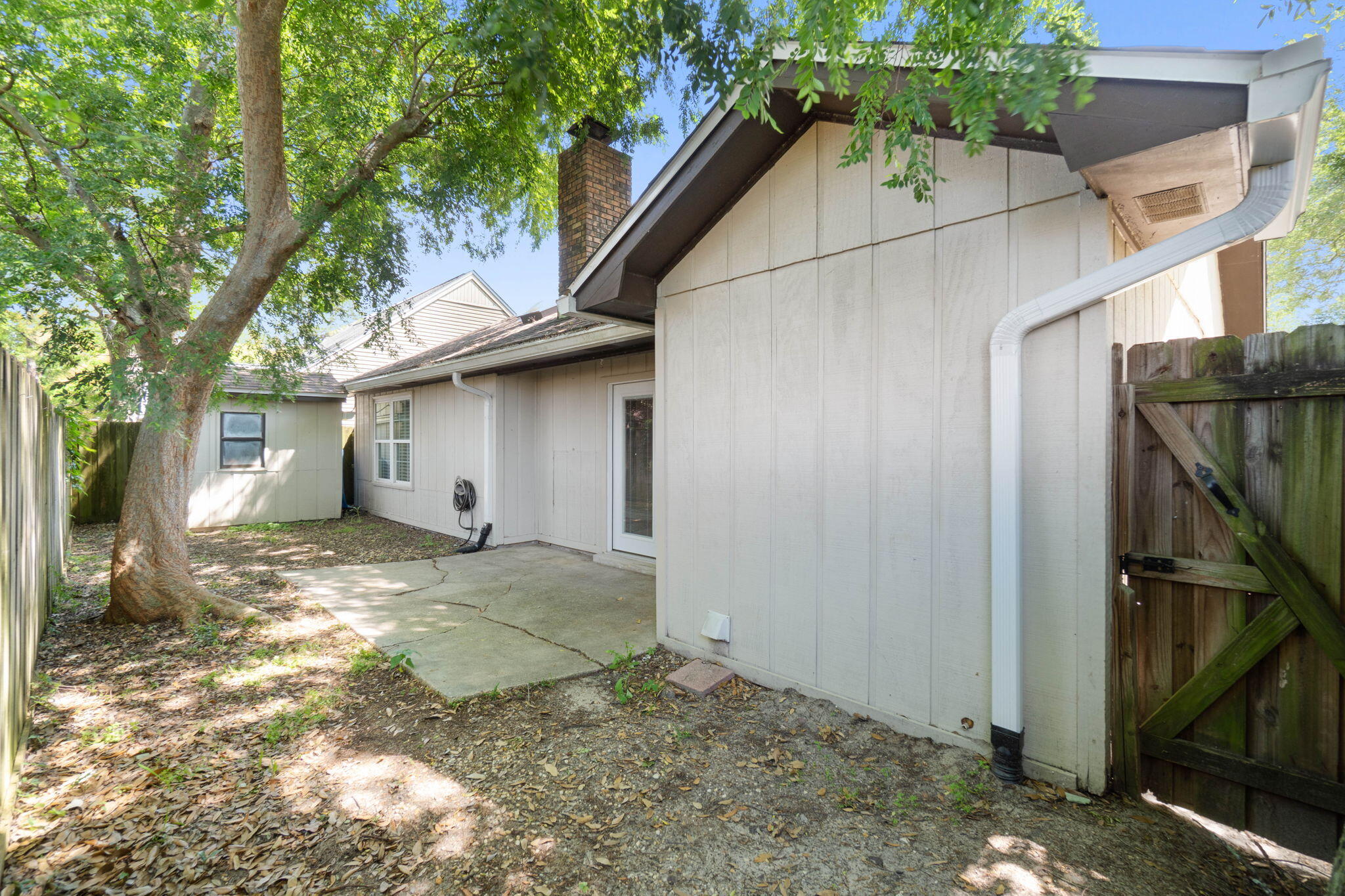 634 Lloyd Street Fort Walton Beach, FL 32547 - Photo 27 of 27 a view of a house with a yard and large tree