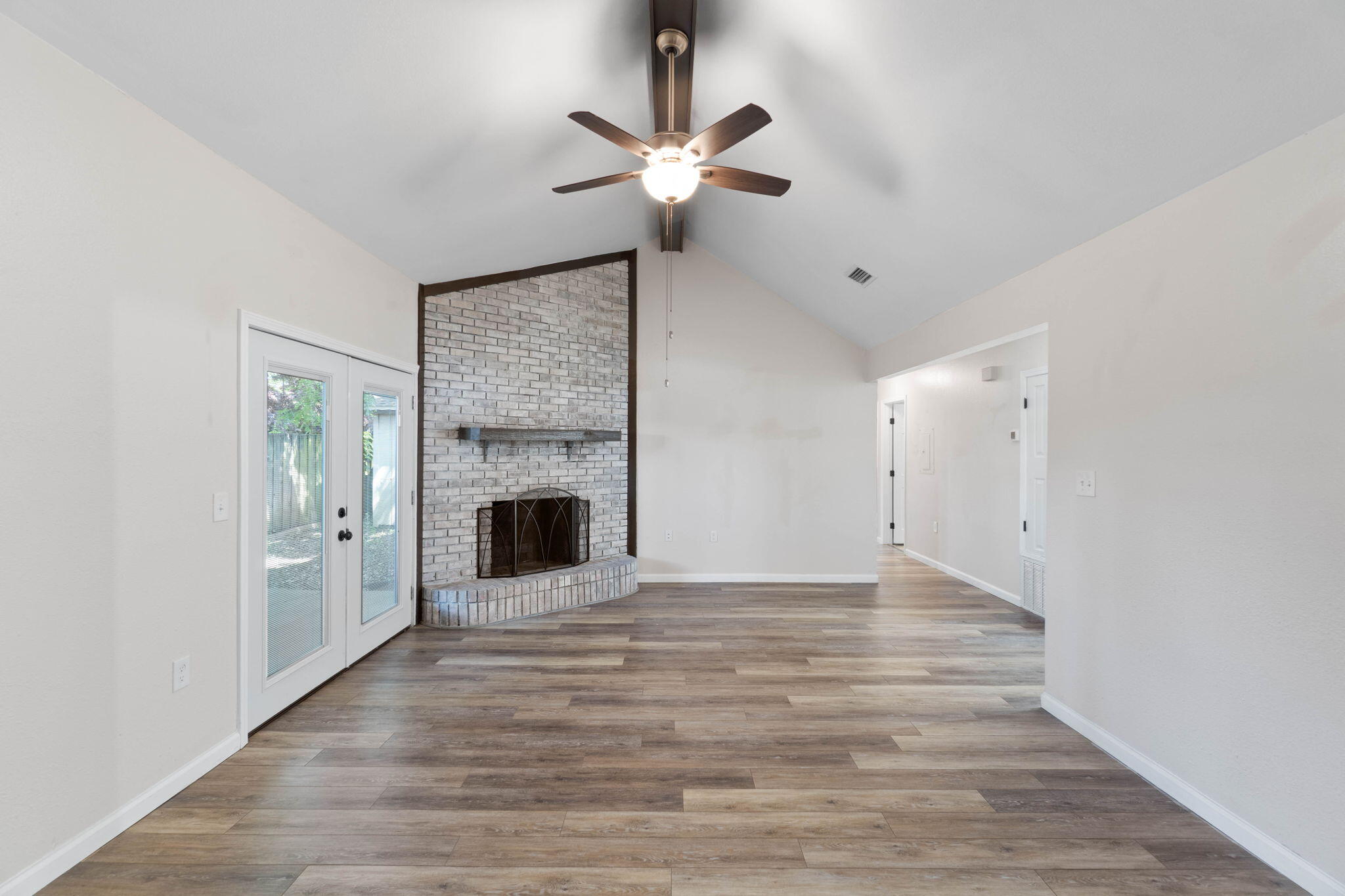 634 Lloyd Street Fort Walton Beach, FL 32547 - Photo 9 of 27 a view of an empty room with a fireplace