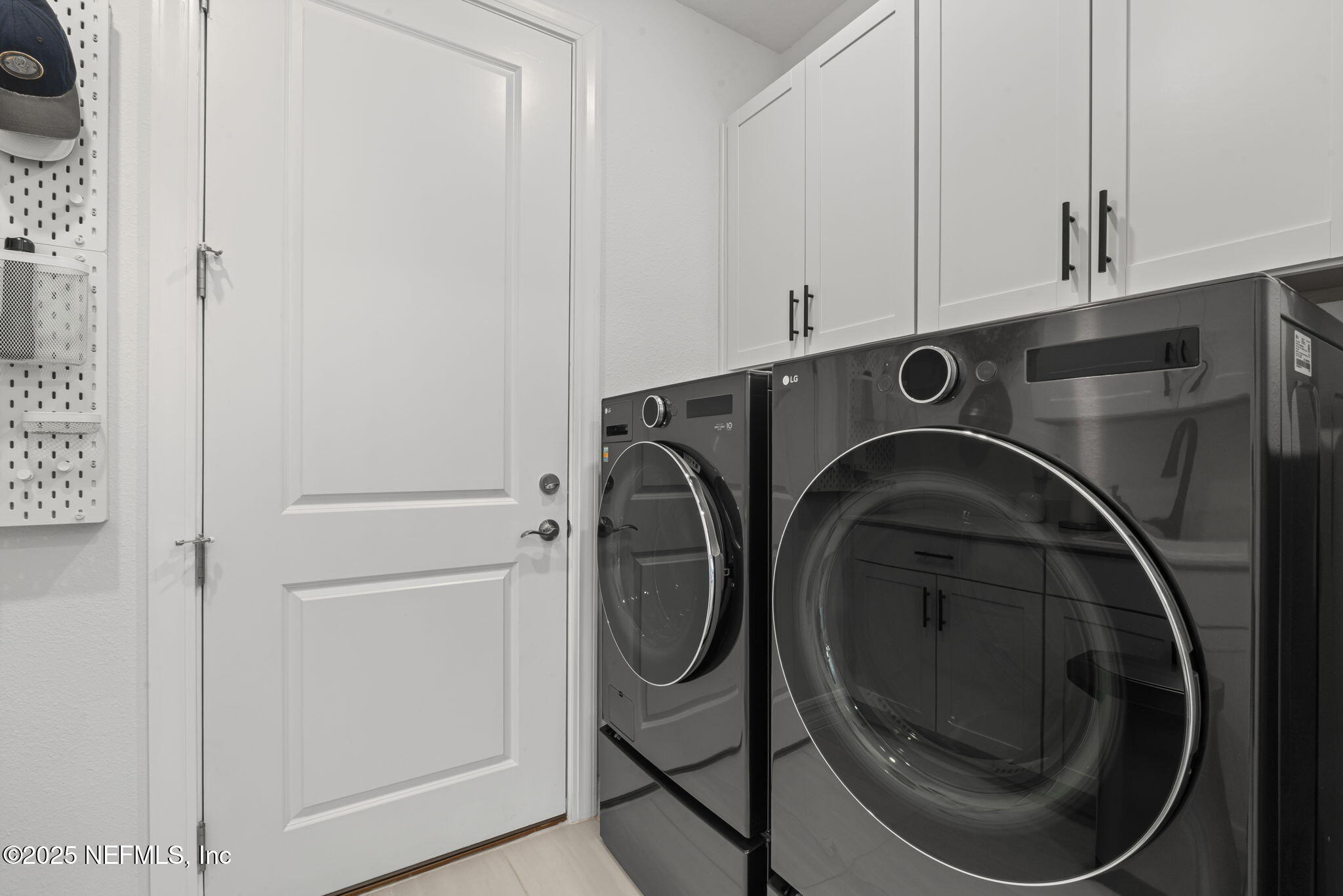 217 Fairlake Cir Street St. Augustine, FL 32092 - Photo 14 of 47 a utility room with dryer and washer