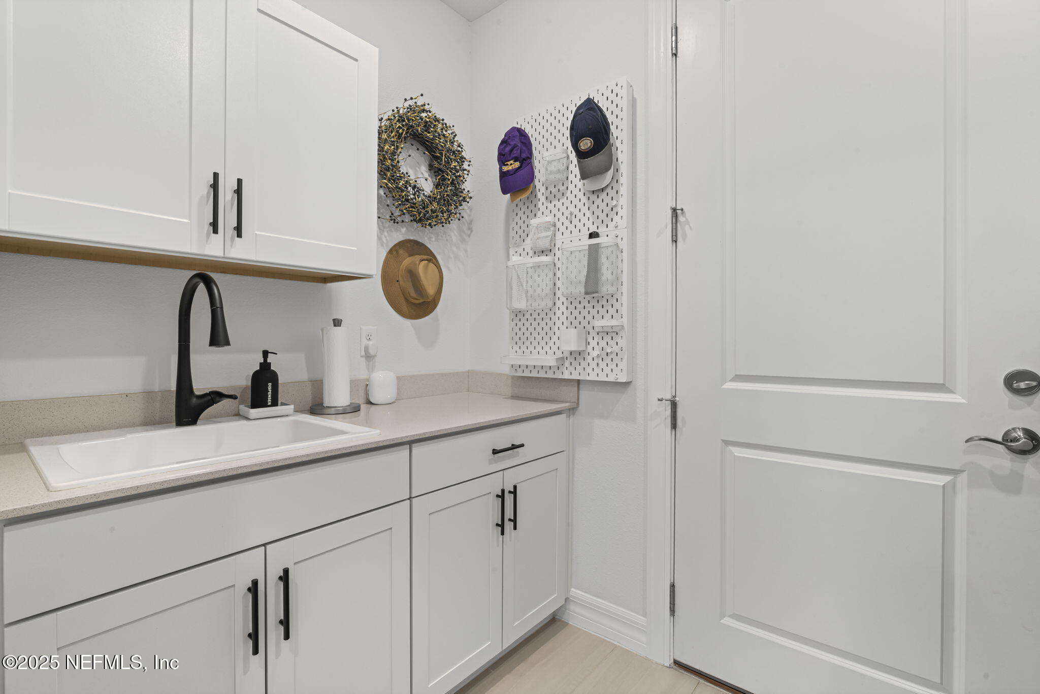 217 Fairlake Cir Street St. Augustine, FL 32092 - Photo 15 of 47 a bathroom with a sink and a mirror