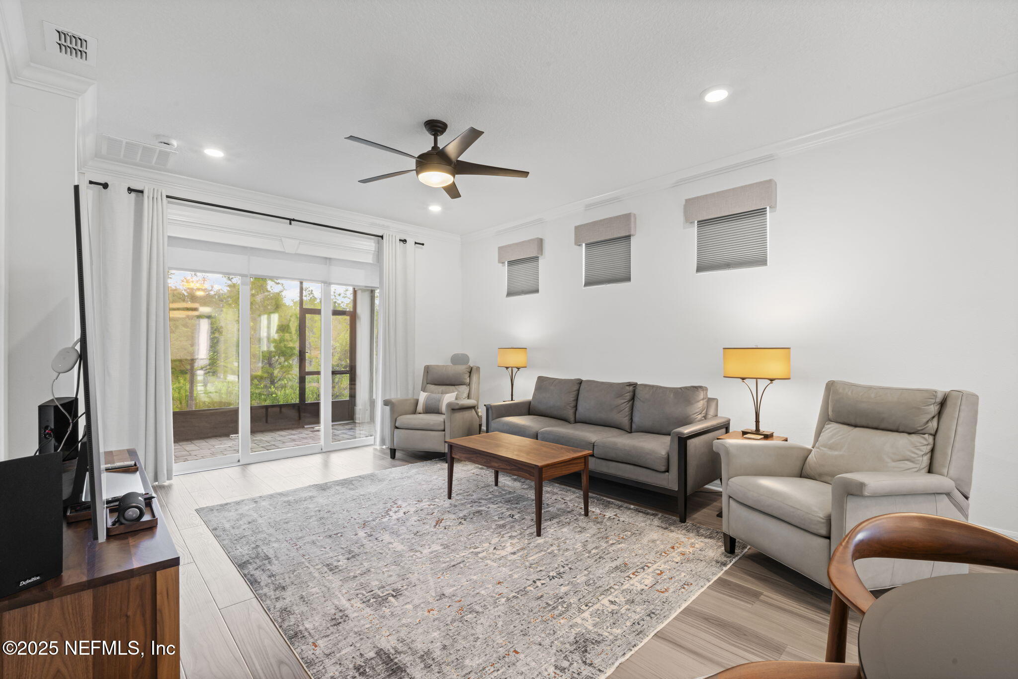 217 Fairlake Cir Street St. Augustine, FL 32092 - Photo 18 of 47 a living room with furniture and a flat screen tv
