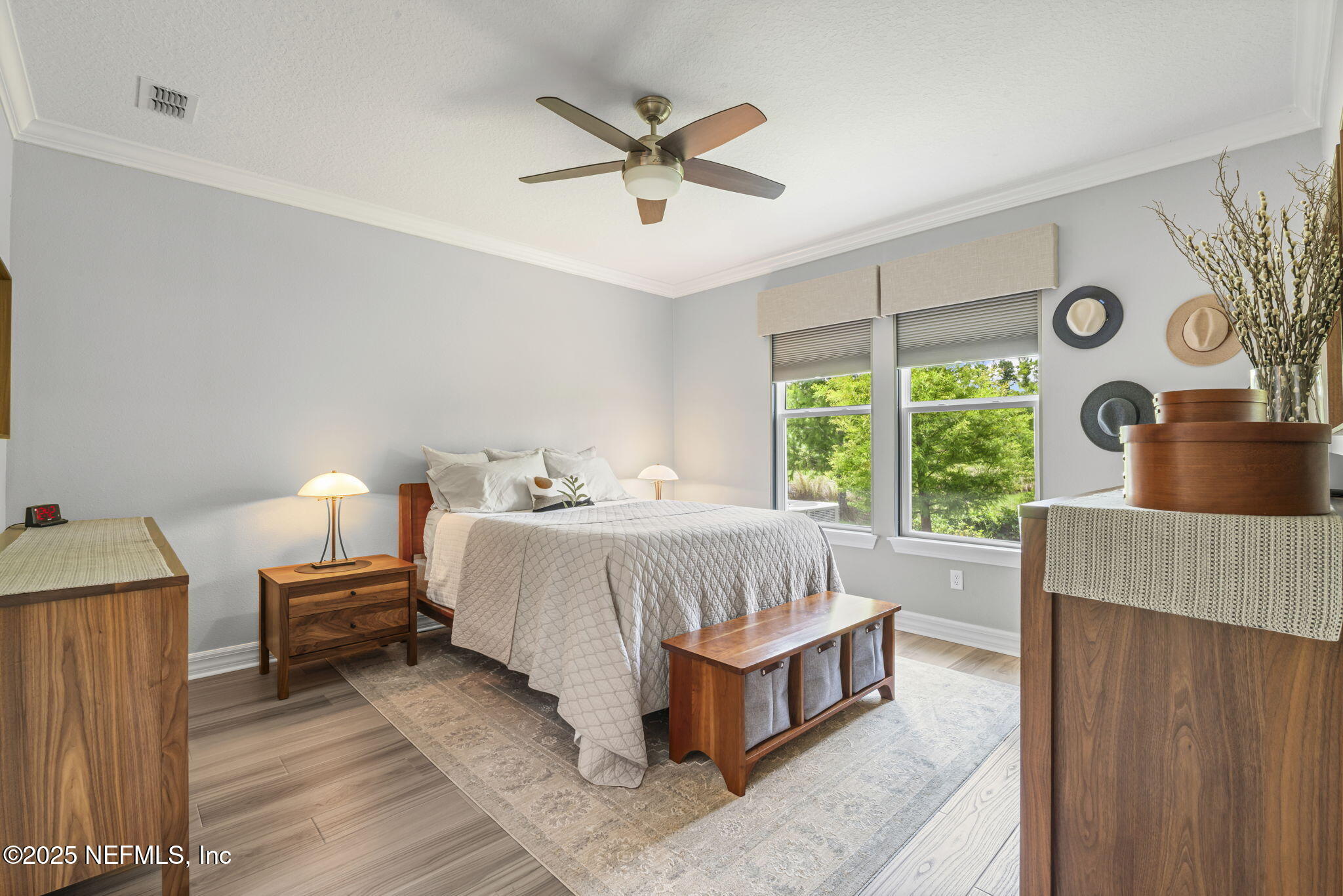 217 Fairlake Cir Street St. Augustine, FL 32092 - Photo 22 of 47 a spacious bedroom with a bed and a window