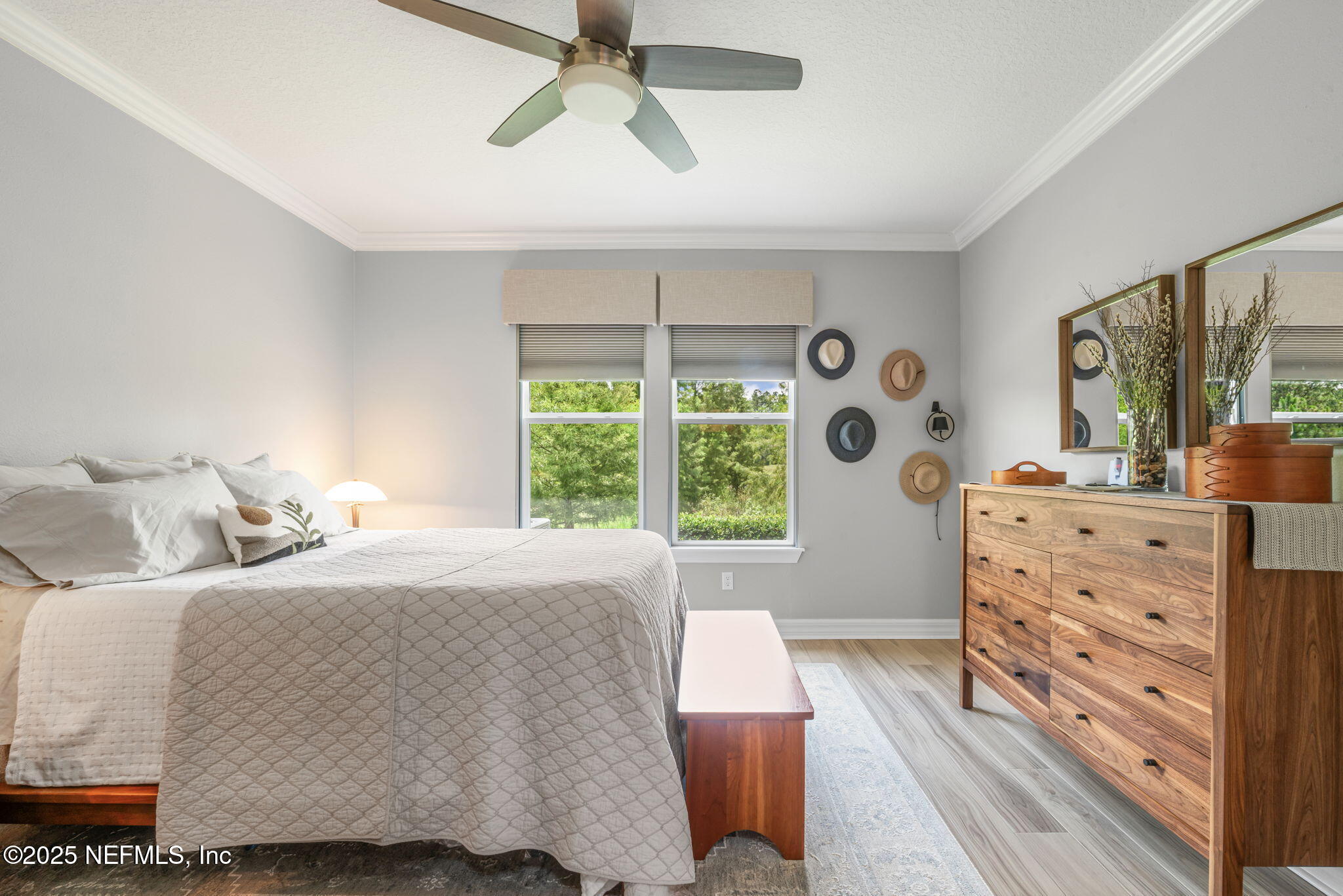 217 Fairlake Cir Street St. Augustine, FL 32092 - Photo 24 of 47 a bedroom with a bed and wooden floor