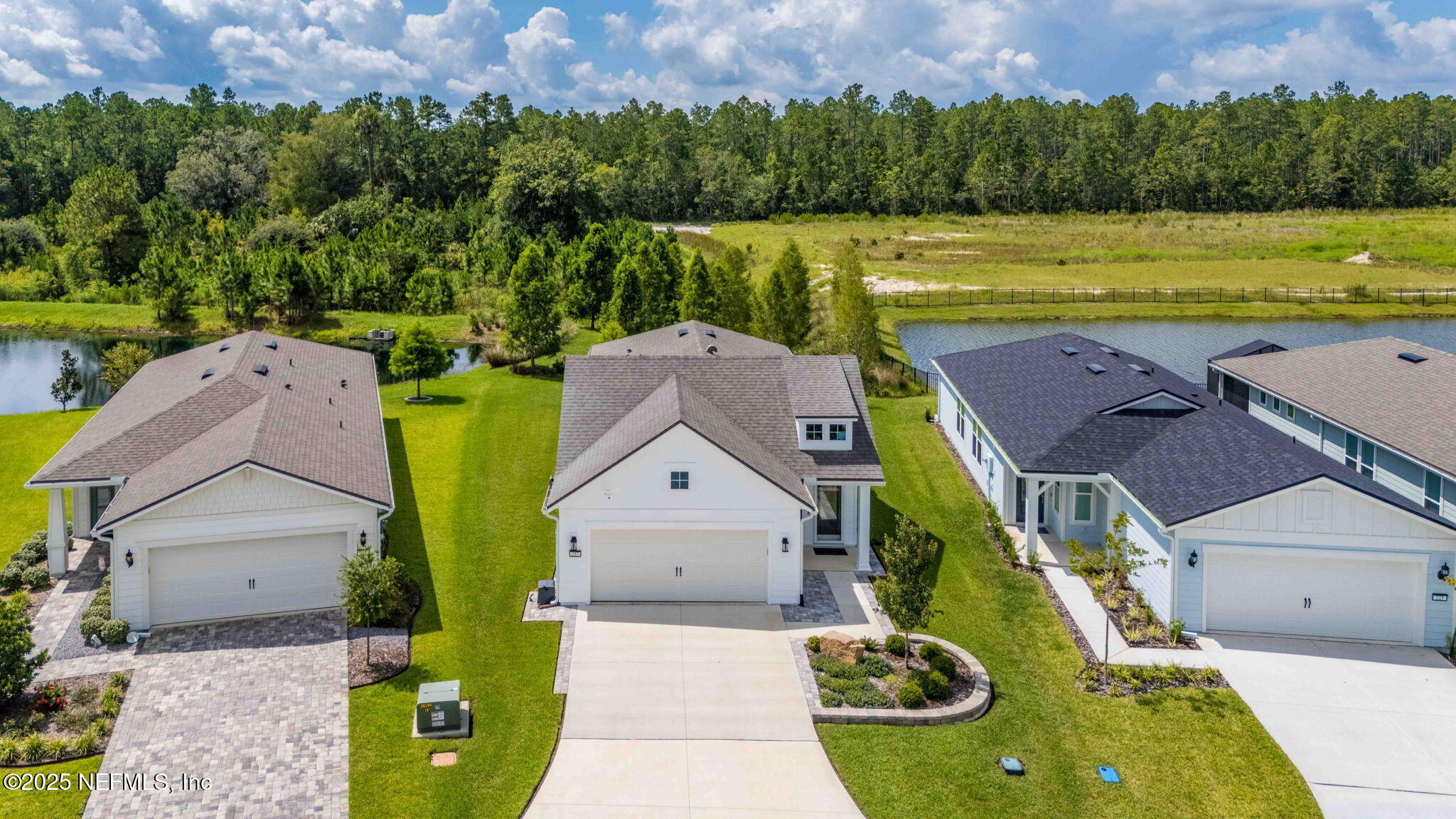 217 Fairlake Cir Street St. Augustine, FL 32092 - Photo 3 of 47 an aerial view of a house with a garden and a swimming pool
