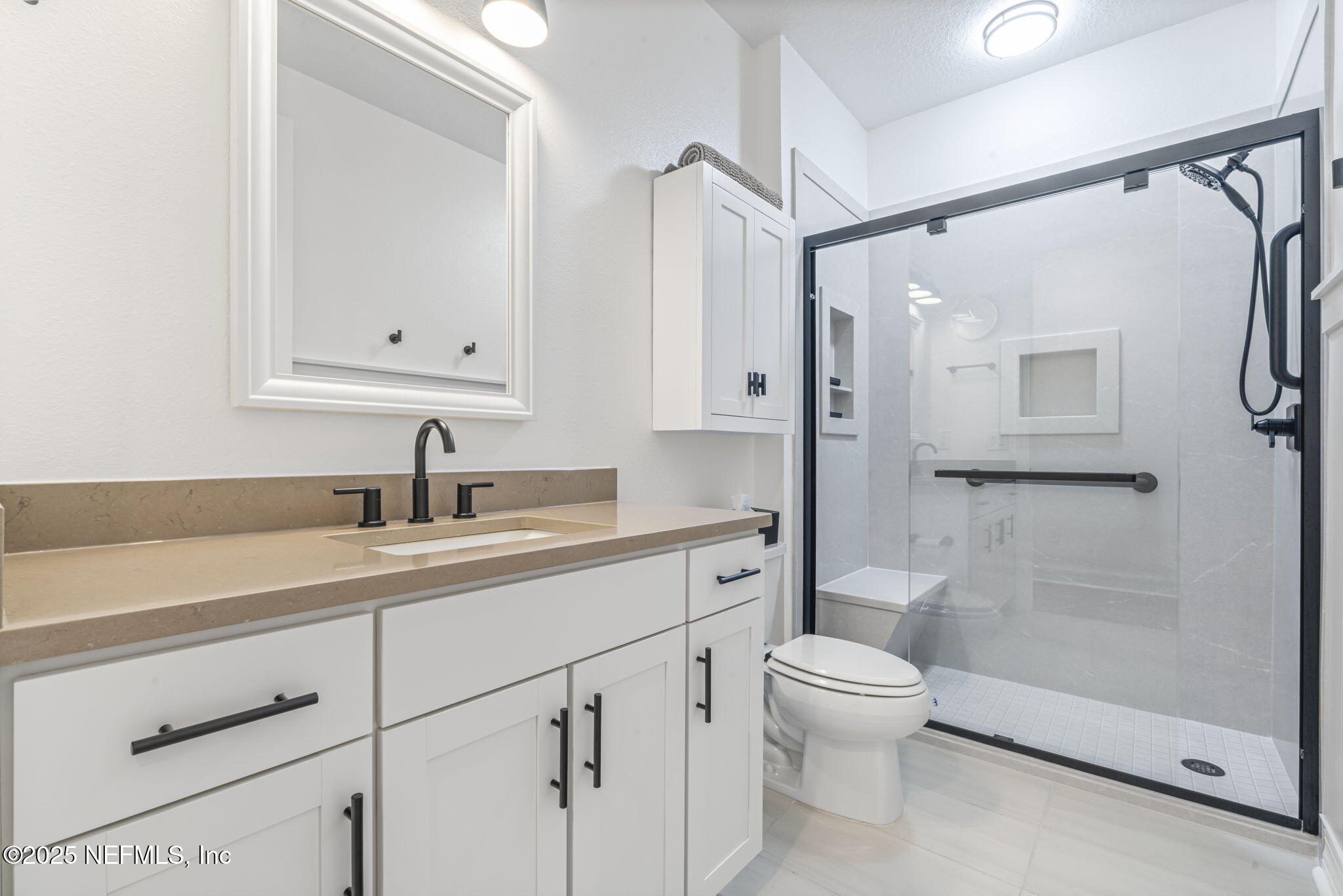 217 Fairlake Cir Street St. Augustine, FL 32092 - Photo 31 of 47 a bathroom with a sink a toilet and shower