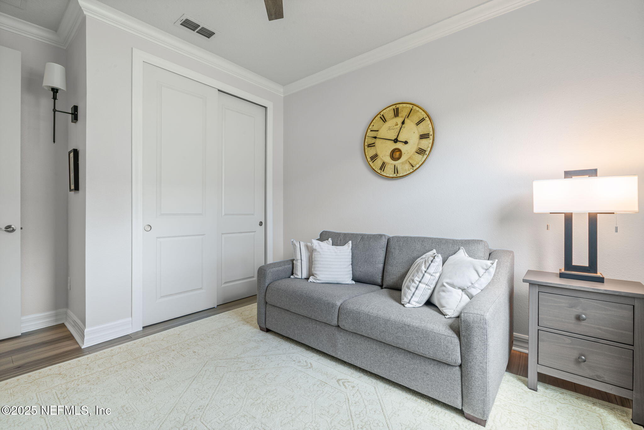 217 Fairlake Cir Street St. Augustine, FL 32092 - Photo 32 of 47 a living room with couch and a window