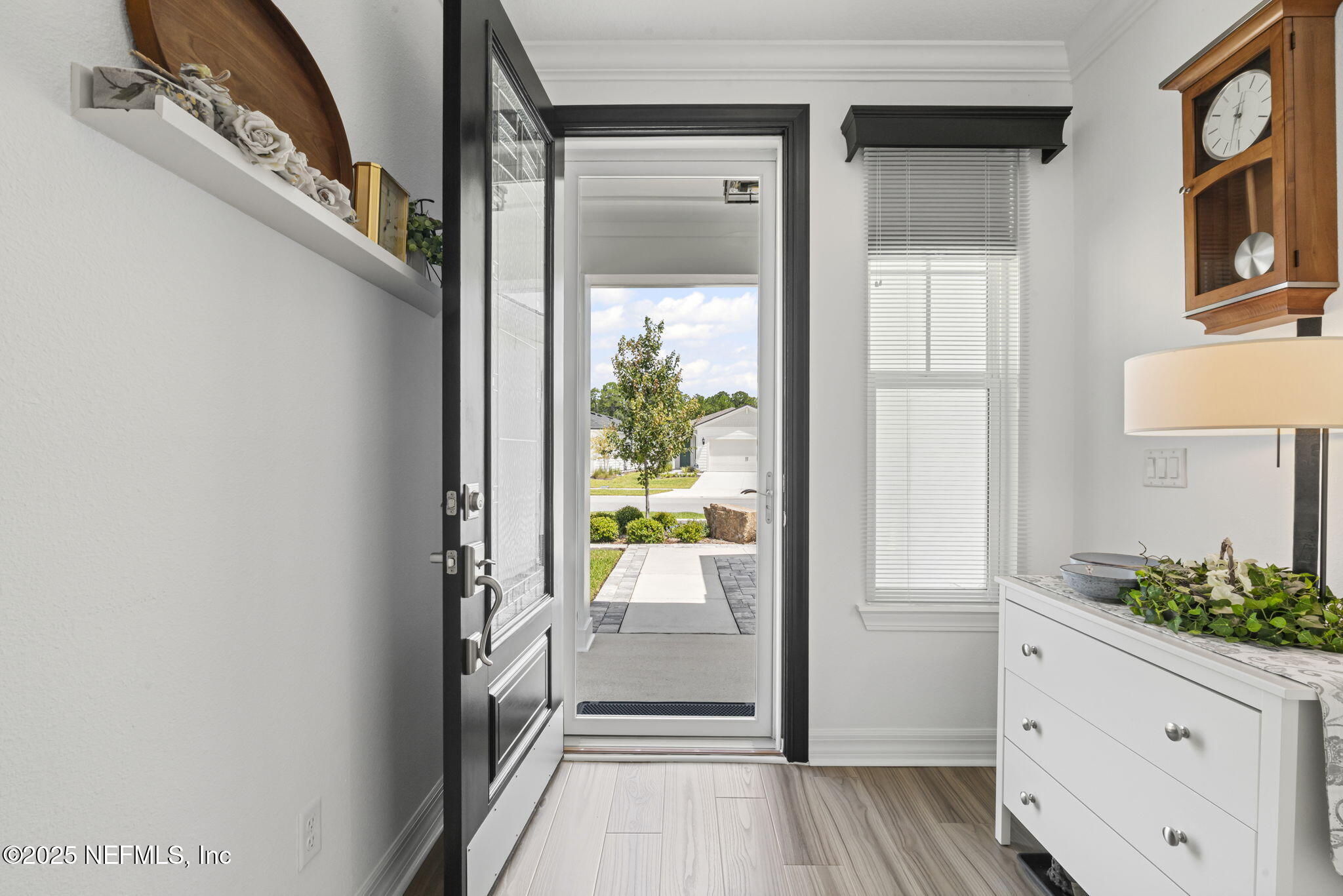217 Fairlake Cir Street St. Augustine, FL 32092 - Photo 7 of 47 a view of a hallway view with wooden floor and staircase